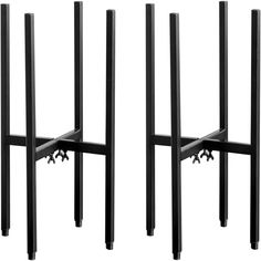 two black metal racks with wheels on them