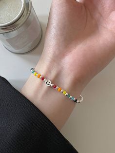 🌈 Spread positivity and good vibes everywhere you go! 🌞💖 The rainbow smiley face is a symbol of happiness, and this bracelet is here to remind you to always keep smiling! 😄✨ #SpreadLove #PositivityMatters #HappyVibesOnly #SmileEveryday #bracelet #jewelry #handmade #necklace #fashion #bracelets #accessories #earrings #jewellery #ring #silver #gold #handmadejewelry #bijoux #jewels #gelang #jewelrydesigner #jewelryaddict #design #jewelrydesign #diamond #instajewelry Happy Face Bracelet, Rainbow Smiley Face, Smiley Bracelet, Smiley Face Bracelet, Jewellery Ring, Smile Everyday, Spread Positivity, Necklace Fashion, Themed Jewelry