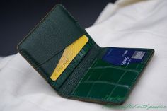 This credit card holder is made of genuine alligator leather and Alran goat leather. The alligator leather is tanned in the highest quality and finished in a very nice green color. It's free from decoloration. The Alran goat leather is well known as one of the best goat leather all over the world. It has a soft touch feeling and deluxe color. DESIGN: This wallet has 1 card slot on the outside for your frequently used card. + 4 card slots on the inside. + 2 hidden slots for folded cash or ID card Luxury Green Wallet With Bill Compartment, Green Leather Business Wallets, Green Luxury Card Holder With Interior Slots, Green Leather Card Holder With Rfid Blocking, Green Leather Rfid Blocking Card Holder, Green Leather Luxury Card Holder, Luxury Green Wallets With Rfid Blocking, Luxury Green Wallet With Rfid Blocking, Luxury Green Leather Card Holder