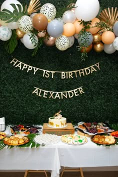 a table topped with lots of cake and desserts