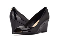 Nine West Cape9X9 - High Heels : Black Patent : The Nine West Cape9X9 peep toe wedges are perfect for any formal or casual meeting. Leather upper. Synthetic lining. Slip-on closure. Peep toe construction. Wedge heel silhouette. Imported. Heel height: 3 inches. Weight of footwear is based on a single item, not a pair. Formal Wedge Sandals For Spring, Spring Formal Wedge Heel Sandals, Formal Spring Wedge Sandals, Spring Formal Wedge Sandals, Formal Spring Wedge Sandals Medium Width, Classic Formal Wedge Heels, Black Wedge Sandals For Workwear In Spring, Formal Medium Width Wedge Heels, Elegant Black Wedge Sandals Medium Width