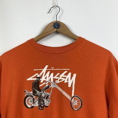 Welcome to our shop. We are waiting for your wishes, also don't be afraid to ask any questions. If you like something from our clothes, just add to favourites or write to us. Follow us on instagram - - ITEM - 90s 00s rare Vintage men's STUSSY big logo Choppers Motorcycles orange t-shirt Size M port outfit top skate style skateboarding made in USA made in USA - SIZE - Size Label (M) Pit - to - Pit - 19,7 (50cm) Shoulders - 18,5 (47cm) Length - 25,6 (65cm) (all our items are measured laying flat) Urban Tops With Logo Print For Skateboarding, Orange Graphic Print Tops For Streetwear, Retro Orange T-shirt For Streetwear, Orange Retro Streetwear T-shirt, Casual Skateboarding T-shirt With Back Print, Casual T-shirt With Back Print For Skateboarding, Port Outfit, Choppers Motorcycles, Outfit Top