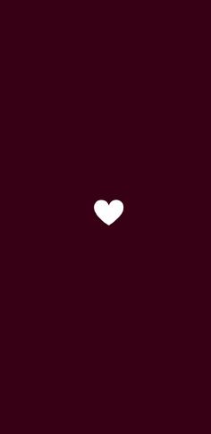 a white heart on a dark red background