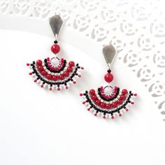 "I created this black red earring by hand, using Swarovski pearls 3mm, Miyuki round seed beads, Miyuki Delica beads and 14k goldfilled push back Closure Stunning, unique and ethnic * Measurements: Earring length: 1.57\" (4cm) Fan element diameter: 1.18\" (3cm) * The earrings will come beautifully packaged for a gift. * For other dangle earrings: https://www.etsy.com/shop/LioraBJewelry/items?section_id=16311270 * my shop: https://www.etsy.com/shop/LioraBJewelry * Shop Policies: https://www.etsy.c Red And Black Beaded Drop Earrings, Red Dangle Jewelry With Bead Caps, Gift Red Beaded Earrings With Bead Caps, Elegant Red Earrings With Black Beads, Red Jewelry With Bead Caps, Red Earrings With Black Beads As Gift, Red Earrings With Black Beads For Gift, Red Drop Earrings With Black Beads, Long Chain Earrings Gold