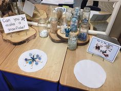 two tables with glass jars and magnets on them that say can you make a snowflake?