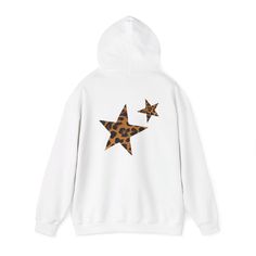 Elevate your casual wardrobe with this unisex garment-dyed sweatshirt, featuring a stylish star design on the back. Crafted from a luxurious blend of 80% ring-spun cotton and 20% polyester, this sweatshirt offers unmatched comfort and durability. The medium-heavy fabric (9.5 oz/yd²) ensures warmth while maintaining a soft, cozy feel. With a relaxed fit, rolled-forward shoulder, and back neck patch, it's designed for effortless style and comfort. The garment-dyed, color-blast fleece with a 100% c Back Print Hoodie, Leopard Print Hoodie, Wild Star, Star Hoodie, Hoodie Y2k, Y2k Hoodie, Y2k Clothes, Downtown Girl, Inspiration Mode