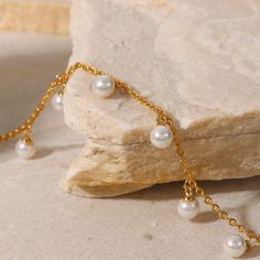 This Pearl Charm Anklet, featuring dainty pearls on an 18k gold-plated chain, embodies delicate elegance. Its graceful design adds a touch of refined beauty to your ankle, making it perfect for both everyday wear and special occasions. Tassel Anklet, Wedding Anklets, Charm Anklet, Pearl Anklet, Gold Anklet, Chain Anklet, Pearl Charms, Chic Accessories, Pendant Design