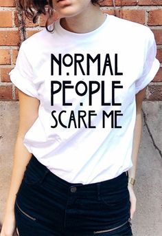 "Normal People Scare Me T-shirt Cool Casual Tumblr Vintage Tee AVAILABLE SIZES: S,M,L,XL,2XL,3XL COLOR: WHITE, BLACK, HEATHER GREY CONDITION: BRAND NEW T-SHIRT SPECS : 100% high quality pre-shrunk cotton (165 g/m2) jersey). Taped neck and shoulders, twin needle stitching, seamless collar. PRINT: Highest quality print - not cheap \"iron-on\" transfers! MEASUREMENTS : width - armpit to armpit ; length - the body length is measured in a straight line from the highest point of the shoulder at the jo White Quote Print T-shirt For Summer, White Summer T-shirt With Quote Print, Summer Crew Neck T-shirt With Quote Print, White Short Sleeve T-shirt With Quote Print, Summer Graphic Tee With Quote Print, White Grunge T-shirt With Funny Print, White Crew Neck T-shirt With Quote, Trendy Quote Print Crew Neck T-shirt, Funny White T-shirt With Quote Print