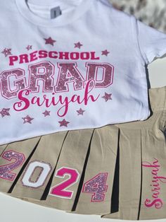 a pair of shorts and t - shirt with the words grad savyah printed on them