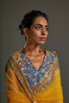 Editor's Note Featuring yellow printed kalidaar lehenga embellished with hand embroidery. This comes with matching angrakha style blouse. This is paired with yellow hand-embroidered net dupatta. Neck: V-Neck Sleeve Type: Short Sleeves Fabric: Chanderi Care: Dry Clean Only Customize Your OutfitCan't find the size you're looking for? No stress. Just select the size "Custom" while adding the item to your cart. We will follow up with you for your body measurements. To request a color or design custo Pink Tassel Earrings, Angrakha Style, Organza Lehenga, Lengha Choli, Net Lehenga, Embroidered Lehenga, Embroidered Wedding, Sharara Set, Wedding Lehenga