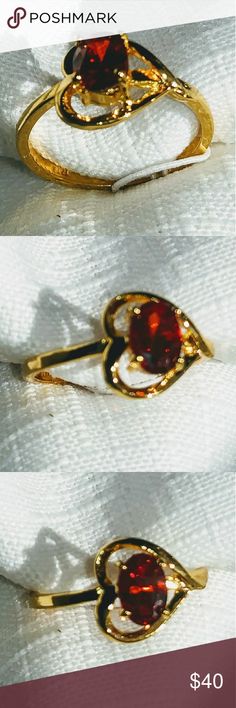 Beautiful dainty garnet heart ring Fun and dainty garnet ring in the shape of a heart. 14k yellow gold Over silver. Sz 7. Also available in citrine and peridot Jewelry Rings Gold Gemstone Heart Ring For Promise, Gold Gemstone Ring For Valentine's Day, Gold Heart Rings With Birthstone, Valentine's Day Gold Ring With Gemstone, Valentine's Day Gold Rings With Gemstones, Valentine's Day Gold Gemstone Ring, Oval Gemstone Heart Ring As Gift, Oval Gemstone Heart Ring For Gifts, Gold Heart Ring With Gemstone For Valentine's Day