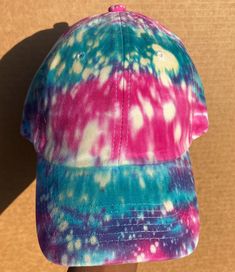 Custom made tie dyed, bleached, and distressed hats made uniquely for you with love by me! I have designed the hats myself and no one hat is exactly the same which will make you stand out in a crowd (in a good way). These hats are great for a day in the sun or to add a pop of color to your outfit, no matter the season the hat will always be in! One size fits all adjustable hats. Adjustable Faded Hats For Spring, Faded Adjustable Hats For Spring, Adjustable Faded Hat For Spring, Faded Adjustable Hat For Spring, Faded Pre-washed Baseball Cap, Trendy Adjustable Faded Hat, Trendy Adjustable Vintage Look Hat, Faded Cap Hat For Summer, Adjustable Faded Summer Hat