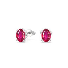 These lustrous gemstone studs display the elegance of the less-is-more aesthetic. Oval Created Rubys dot the earrings with vivid beauty. Underneath each colored gem is an under halo of lab-grown diamonds for that unexpected sparkle. Gorgeous Engagement Ring, Halo Earrings, Colored Gems, Gemstone Studs, Ruby Gemstone, Lab Diamonds, Diamond Earrings Studs, High Quality Jewelry, Diamond Studs