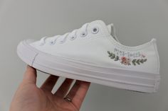 A pair of Converse canvas all white low tops perfect for any bride/bridal party or groom/groomsmen.  The shoes will be embroidered along the ankle seam of the outer facing side of each shoe with your chosen name or initials and date. The embroidery includes a cluster of roses with whimsical foliage framing the embroidered customisation.  The colour of the embroidery threads can be changed to match you colour scheme/palette preferences so please get in touch or alternatively leave details of your Converse For Wedding, Platform Converse High Tops, White Platform Converse, Converse Embroidery, Wedding Platform, Embroidered Converse, Wedding Converse, Low Top Converse, Platform Converse