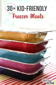 three tin foil containers stacked on top of each other with text overlay reading 30 kid - friendly freeze meals