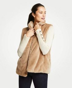 A Faux Fur Vest Can Perk Up Any Outfit. It is a perfect statement piece for fall weather when you don't need to wrap yourself in a big coat. An outfit paired with a faux fur vest and jeans/ leggings looks amazing for casual outings or even parties! #fauxfurvest #fauxfurvestoutfir #fauxfur #falloutfit #fallfashion #anntaylor #ad Mom Casual Outfits, Ann Taylor Outfits, Front Tie Sweater, Casual Outfits For Fall, Style A Scarf, Faux Vest, Kelly In The City, Dress Coats, Taylor Outfits