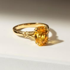 Gold Rings With Gemstone, Gold Engagement Ring Yellow Stone, Oval Yellow Sapphire Ring Gold Women, Gold Ring With Yellow Stone, Yellow Gem Ring, Yellow Gold Rings Engagement, Yellow Rings Stones, Yellow Sapphire Ring Designs, Pukhraj Ring Design For Women In Gold