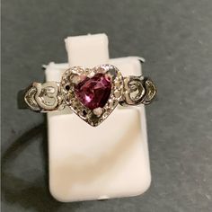 Really Cute Silver Plated Ring, With A Lavender Heart Stone Surrounded By Tiny Clear Stones And Two Cut Out Hearts Going Down Either Side. Size 8 1/2. Extravagant Dresses, Lavender Heart, Heart Stone, 2 Rings, Clear Stone, Pink Ring, Plated Ring, Stone Heart, Womens Jewelry Rings