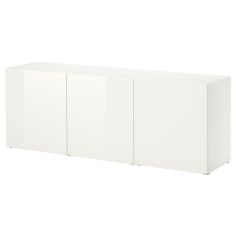 a white cabinet with four doors and three drawers