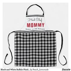 a black and white buffalo plaid apron with the words, feed my mommy queen of the kitchen