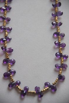 Amethyst Necklace Amethyst Gold Plated Necklace Amethyst Beaded Necklace Amethyst Tear Drop Necklace Material - Brass Hand Made Amethyst Necklace Size - 23 inches Delivery time frames (from date of shipping) - USA: ~2 weeks - Rest of the World: ~ 3-4 weeks EXPRESS SHIPPING CHARGES IS --- 15 $ IS WILL TAKE 3-5 DAYS for bulk order please conservation or mail on rahulsarraf09 [!at] gmail.com If you have any doubt or question regarding our product then please feel free to contact us we will happy to Faceted Amethyst Briolette Necklace, Purple Faceted Briolette Necklace, Purple Briolette Faceted Necklace, Purple Amethyst Briolette Necklace, Purple Briolette Amethyst Necklace, Purple Briolette Crystal Gemstone Necklace, Purple Briolette Gemstone Crystal Necklace, Purple Faceted Amethyst Crystal Necklaces, Purple Faceted Amethyst Crystal Necklace