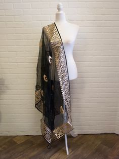 *Includes one piece - dupatta only (shawl) *Style: Black with Gota Patti border *Our store is located in Los Angeles and in-store pick up is welcome. Luxury Black Chinon Dupatta, Black Bohemian Dupatta With Pallu, Luxury Black Shawl Dupatta, Black Semi-stitched Dupatta, Black Organza Dupatta, Black Silk Bohemian Dupatta, Black Dupatta, Shawl Style, Set Saree