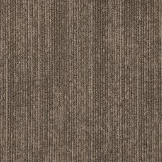 a brown carpet textured with vertical stripes