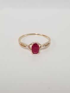 "Thanks for shopping our vintage estate store. We tend to sell well below wholesale and truly hope you enjoy all of our items. Many of the items are one of a kind, so please enjoy scrolling through the pictures and hopefully something will catch your eye. Estate 14k yellow gold natural red 1/2ct ruby birthstone or graduation ring. It's sweet. Just stunning ring. Ring size: 4.5 Setting: 6mm 1/4\" by 4mm Band width: 1mm Weight: 1.07 grams Carat: 1/2 Stunning ring, one that you will love. Marked 14k." Classic Red Oval Birthstone Ring, Classic Oval Red Birthstone Ring, Oval Ruby Ring In 14k Gold As Gift, Valentine's Day Oval Diamond Ring With Prong Setting, Valentine's Day Classic Yellow Gold Birthstone Ring, Classic 14k Gold Ruby Ring For Valentine's Day, Classic Round Ruby Ring For Valentine's Day, Classic Rings With Prong Setting For Valentine's Day, Classic Valentine's Day Ruby Ring In 14k Gold