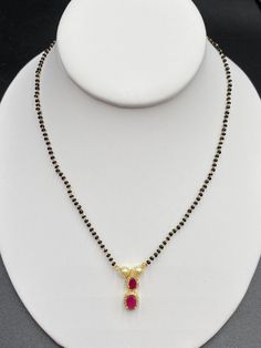 Single line black beads chain with Ruby Stones pendant Handmade jewelry One gram gold jewelry Silver plated jewelry Official Website globusfashions.com 🌸 S H O P . M O R E . S T Y L E S 🌸 https://www.etsy.com/shop/Globusfashions Necklaces - https://www.etsy.com/shop/Globusfashions?section_id=18712263 Bracelets - https://www.etsy.com/shop/Globusfashions?section_id=18969767 Pendant Sets - https://www.etsy.com/shop/Globusfashions?section_id=18707402 Tikka - https://www.etsy.com/shop/Globusfashion Black Necklace With Gold Beads As Gift, Black Pearl Chain Jewelry For Formal Occasions, Black Temple Jewelry For Celebrations, Formal Black Jewelry With Pearl Chain, Formal Black Pearl Chain Jewelry, Black Pendant Necklaces With Beaded Chain, Black Pearl Chain Necklace For Gift, Black Pearl Chain Necklace As Gift, Black Pearl Chain Necklace Gift