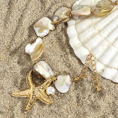 Boho Exquisite Gold Starfish Charm Bracelet - Summer Beach Fashion Jewelry for Women Elevate your summer style with the Boho Exquisite Gold Starfish Charm Bracelet. This elegant piece features a charming gold starfish pendant, embodying the essence of beach fashion and boho chic. Crafted with attention to detail, this bracelet combines classic elegance with a playful summer vibe. Its gold color adds a touch of sophistication, while the starfish charm evokes a sense of coastal adventure. Perfect Elegant Starfish Jewelry For Vacation, Elegant Starfish Shaped Jewelry For Vacation, Elegant Starfish Charm Jewelry For Vacation, Elegant Gold Bracelets For Vacation, Starfish Shell Jewelry For Beach, Gold Bracelets With Lobster Clasp For Vacation, Gold Jewelry With Star Charm For Vacation, Gold Bracelet With Lobster Clasp For Vacation, Beach Jewelry With Adjustable Star Charm