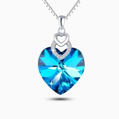 An explosion of beautiful colors, our Heart of the Ocean is crafted in 925 Sterling Silver that features a gorgeously crafted heart stone pendant. Exclusively available in silver. This bright sparkling necklace adds some “wow factor” to your wardrobe! Premium Materials - Made from authentic gemstones & nickel-free metal Valentine's Day Crystal Pendant Necklace, Cubic Zirconia Gemstone Heart Pendant Necklace, Crystal Heart Pendant Jewelry For Her, Silver Heart Crystal Necklace, Crystal Heart Pendant Jewelry Gift For Her, Sapphire Heart Pendant Birthstone Jewelry, Crystal Necklaces With Heart Charm For Gift, Sapphire Heart Pendant With Heart Charm, Sapphire Heart Pendant Jewelry As Gift