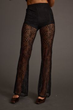 Look lovely in lace in the Happy Hour Black Lace Flare Pant. Inspired by the best selling Midnight Hour Velvet Burnout Flare Pants, we've created a new flare pant in lace with the same sexy sheer look you love. Made with brief shorts, you can wear the Midnight Hour with your favorite going out tops and oversized blazers. Fitted Bottoms With Lace Trim For Evening, Fitted Lace Trim Bottoms For Evening, Black Bottoms With Lace Trim For Night Out, Chic Lace Bottoms For Evening, Lace Flare Pants For Party, Chic Lace Evening Bottoms, Flare Lace Bottoms For Party, Black Lace High Waist Bottoms, Lace Flare Bottoms For Party