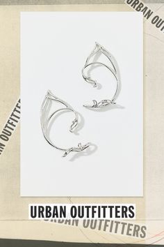 Set of two longline cuff earrings in a pointed silhouette for a magical touch. Features Fey pointed ear cuffs Set of two longline ear cuffs Pointed silhouette Cuff earrings backing Content + Care Set of 2 Mixed metal Avoid contact with water Imported | Fey Pointed Ear Cuff Set in Silver, Women's at Urban Outfitters Elegant Silver Jewelry By Urban Outfitters, Elegant Silver Jewelry From Urban Outfitters, Pointed Ears, Men's Shoes Accessories, Ear Cuffs, Women Men Shoes, Cuff Earrings, Mixed Metals, Color Coding