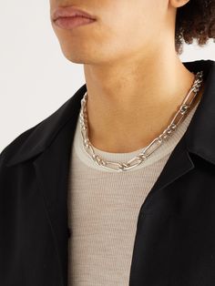 MAOR's 'Unity' collection explores innovative ways of using intertwined links, celebrating the beauty of human connection. This necklace is crafted with a directional silver chain that's polished for a high-shine finish. It's fitted with a hidden lock mechanism that allows it to be worn in any direction without the fastening showing. Modern Silver Link Chain Jewelry, Silver Link Chain Necklace For Formal Occasions, Silver Link Chain Necklace For Formal Events, Modern Sterling Silver Link Jewelry, Timeless Silver Link Jewelry, Formal Silver Link Chain Necklace, Elegant Silver Link Chain Jewelry, Formal Chain Link Necklace With Polished Finish, Silver Cable Chain Necklace For Formal Occasions