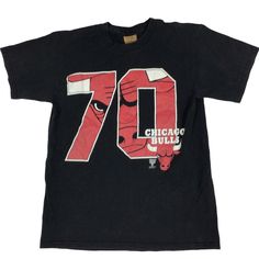 Vintage 90s Chicago Bulls NBA T-shirt. Made in the USA. Nutmeg. Large from graphic Measures as a small. 19 inches pit to pit, 27 inches long. No rips, tears, or stains. Slightly faded. Smoke and pet. Free home. Vintage NBA. 70 wins. Chicago Bulls. 90s. USA made. Retro Sports T-shirt With Graphic Print, Casual Basketball T-shirt With Screen Print, Casual Basketball T-shirt With Letter Print, Throwback Crew Neck Fan Merchandise Tops, Throwback Graphic Print Fan Gear Top, Casual Graphic T-shirt For Sports Events, Throwback Graphic Print Tops For Sports Events, Basketball Graphic Tee With Crew Neck, Graphic Tee T-shirt For Basketball With Graphic Print