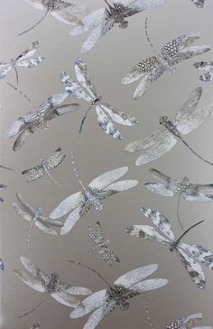 the wallpaper is decorated with silver dragonflies on grey and white background, as well as metallic foil