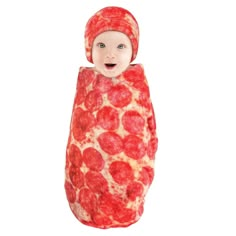 a baby dressed in a pepperoni costume