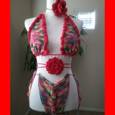 2 Piece Multi Colored Bikini, Hand Made, Hand Wash Only Not Machine Safe. Red Summer Halter Top, Red Tropical Halter Neck Swimwear, Fitted Bohemian Swimwear For Party, Red Halter Neck Top For Poolside, Red Triangle Halter Top For Beach, Red Triangle Halter Top For Spring, Red Halter Neck Top For Beach Season, Red Halter Top For Beach Season Party, Red Halter Top For Beach Season Swimming