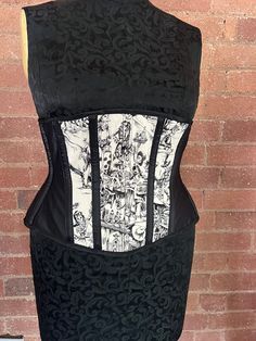 Underbust corset with an incredible intricate skeleton cowboy pattern fabric on the front panels.   The corset is made with a strength layer of Coutil and is boned with a mixture of flat and spiral steel bones, it is back lacing only.    The corset measures 34" at the waist and so would probably best suit natural waists in the region of 37-40"  Fully laced the corset measures   Underbust 39"  Waist 34"  Upped hip 36"  Length at front centre 12" Cowboy Pattern, Skeleton Cowboy, Underbust Corset, Corset Lingerie, Pattern Fabric, Corsets, Cool Suits, Fabric Patterns, Skeleton