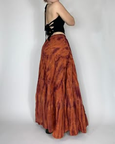 This flowing tie dye maxi skirt with an elastic waistband exudes boho charm. Each piece is a unique work of art, featuring slight variations in patterns and colors. Ideal for casual outings or dressing up for special occasions. Model is 5'2 and wearing a size small. Measurements: Size small: best for 24’-31’ waist Material: 100% cotton Colorful Skirt Outfits, Aesthetic Polos, Long Skirt Outfits For Summer, Orange Maxi Skirt, Tie Dye Maxi Skirt, Long Skirt Outfits, Earthy Outfits, Maxi Skirt Outfits, Tie Dye Outfits