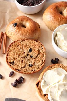 bread, cream and raisins are on the table