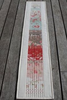 a table runner on a wooden deck