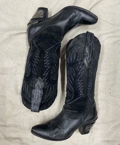 Vintage black with blue and white stitching cowboy boots good condition very rare size 6.5-7.5 Fitted Black Heeled Boots For Western-themed Events, Fitted Black Heeled Boots For Ranch, Black Mid-calf Boots For Western-themed Winter Events, Black Mid-calf Boots For Winter Western-themed Events, Black Heeled Boots For Western-themed Winter Events, Black Knee-high Heeled Boots For Rodeo, Black Pointed Toe Heeled Boots For Rodeo, Western-style Mid-calf Heeled Boots For Western-themed Events, Black Knee-high Heeled Boots For Western-themed Events