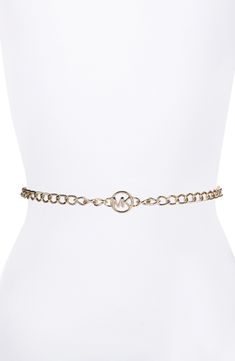 Update your ensemble with the modern sophistication of a goldtone chain belt complete with a logo medallion. Goldtone plate Imported Elegant Gold-tone Chain Link Jewelry With Logo Plaque, Elegant Gold-tone Jewelry With Metal Logo, Elegant Gold-tone Chain Link Jewelry, Elegant Gold Jewelry With Metal Logo, Michael Kors Logo, Summer Wardrobe Essentials, Wedding Guest Shoes, Sneaker Slippers, Modern Shop