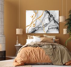 a bed with an orange comforter in a bedroom next to a painting on the wall