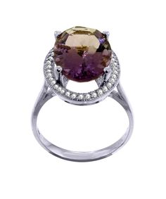 ITEM INFORMATION Made in USA Product Type Ring Condition New Gender Women's Total Item Weight 4.40 grams (approx.) Total Carat Weight 5.31ctw (approx.) Product Dimensions W 27.00mm MATERIAL INFORMATION Material Type(s) 14k Material Color(s) colors available in mutliple options PRIMARY GEMSTONE INFO Gemstone Amethyst / 1 pcs Composition Natural Total Carat Weight Approx. 5.16ct Shape and Cut Oval Color Grade Purple Setting Type Prong SECONDARY GEMSTONE INFO Gemstone Accent Diamond Total Carat Wei Amethyst And Diamond Ring, Gold Halo, Type S, February Birthstone, February Birth Stone, Amethyst Gemstone, Exquisite Jewelry, Amethyst Ring, Cocktail Ring