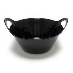 two black bowls sitting side by side on a white surface with one empty bowl in the middle