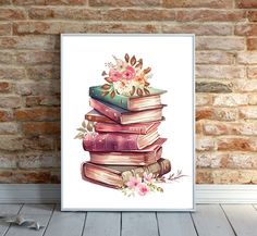 a stack of books with flowers on top