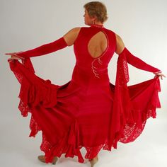 will fit size 9/10-13/14, stretchy …5″7″ or taller This opulent red stretch velvet ballroom dress captivates with its clip-n-cut chiffon insets and flounces that create a unique, mesmerizing look and effortless swish when you dance. Glimmering CAB Swarovski rhinestones plus an inset traversing the bodice and matching gauntlets with small floats make this a must-have for standard and American smooth styles. Not to mention, the keyhole back adds subtle sophistication. Unmissable offer - don't miss Red Velvet Gala Dress, Red Stretch Evening Dress For Gala, Fitted Floor-length Velvet Dress For Gala, Fitted Velvet Floor-length Dress For Gala, Red Fitted Floor-length Velvet Dress, Fitted Floor-length Red Velvet Dress, Fitted Red Velvet Floor-length Dress, Red Velvet Dress With Fitted Bodice, Red Fitted Dress For Dance