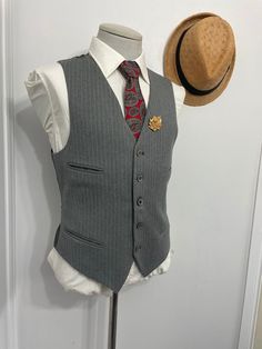 "GoodMorning,  vintage ultra wool vest, waistcoat, country sports coat vest. This vest features five buttons. two front chest jetted pocket and two hip jetted pockets. This vest is a good grab for vintage enthusiast who loves vintage classic vest / waistcoats.  Estimated size: 38 Medium : Please see measurement below , for best fit compare measurement with similar vest waistcoat or item. Armpit to Armpit: 20\" Front Length: 23.5\" Condition: Pre-owned and in a well-off-taking care condition.  DO Winter Formal Vest For Business, Classic Business Vest For Winter, Wool Vest With Pockets For Tailoring, Tailored Vintage Winter Vest, Classic Winter Vest With Buttons, Winter Tailoring Vest With Buttons, Tailored Vintage Fall Vest, Vintage Business Vest For Fall, Vintage Tailored Vest For Fall